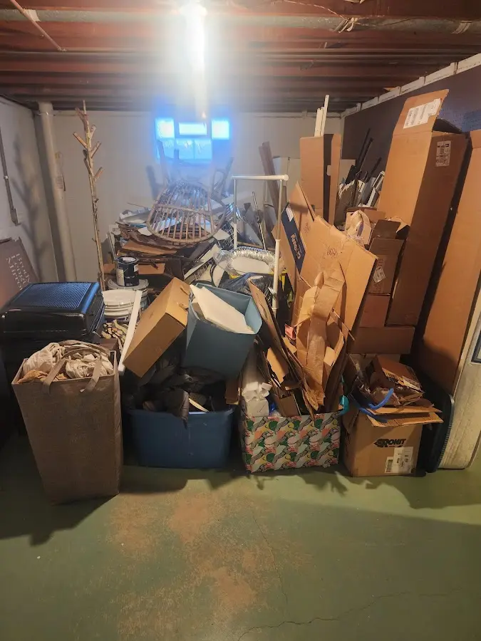 Roll-off dumpster container at job site for Concrete Dumpster Rental in East Greenwich